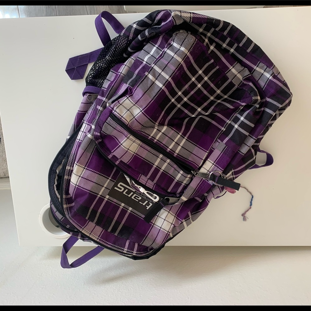 black and purple jansport backpack